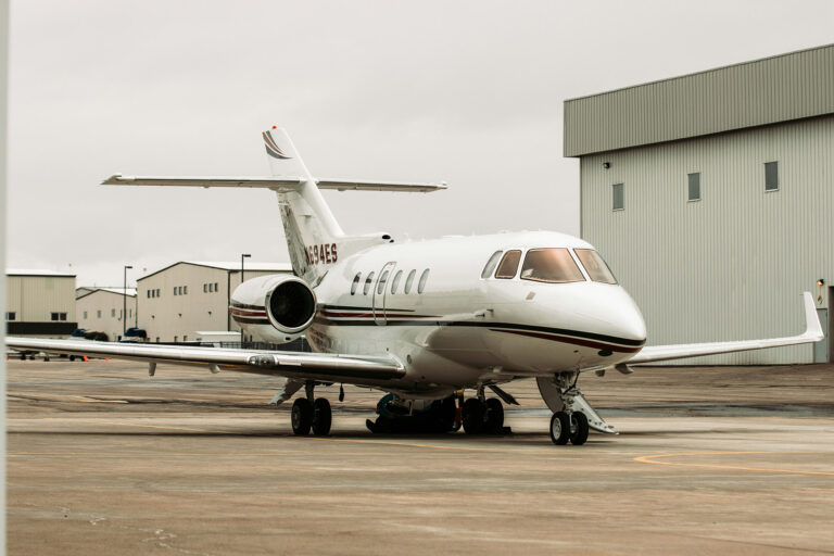 Private jet on the apron at a business aviation airport